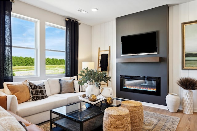 living room with light hardwood / wood-style floors