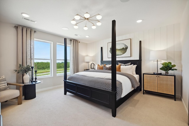 bedroom featuring light carpet