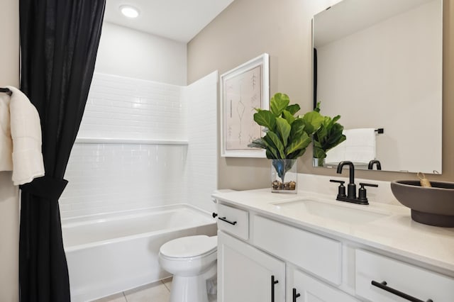 full bathroom with vanity, shower / bath combo, tile patterned floors, and toilet