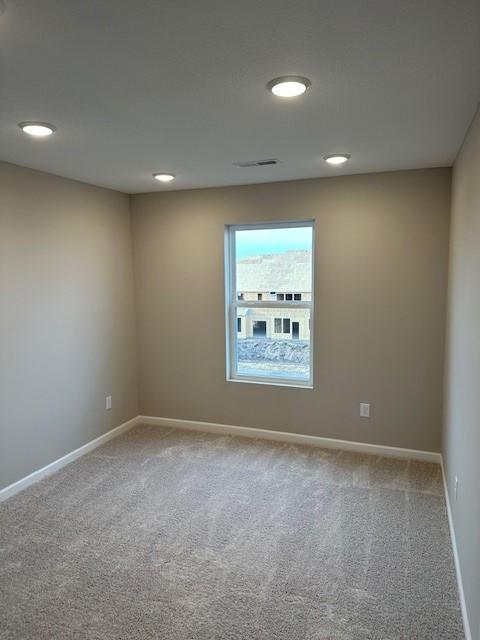 view of carpeted spare room