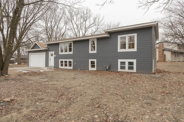 split foyer home featuring a garage