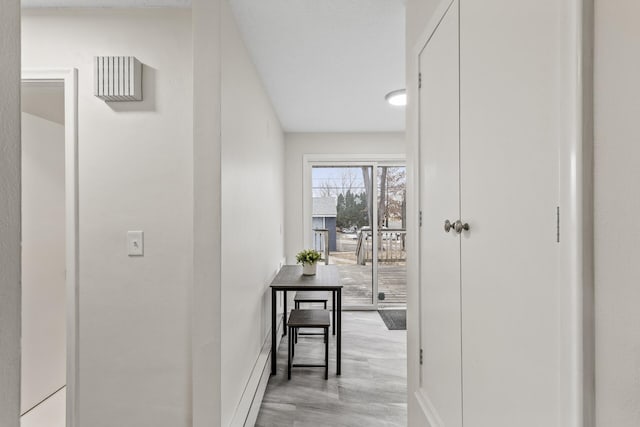 hallway featuring light hardwood / wood-style floors