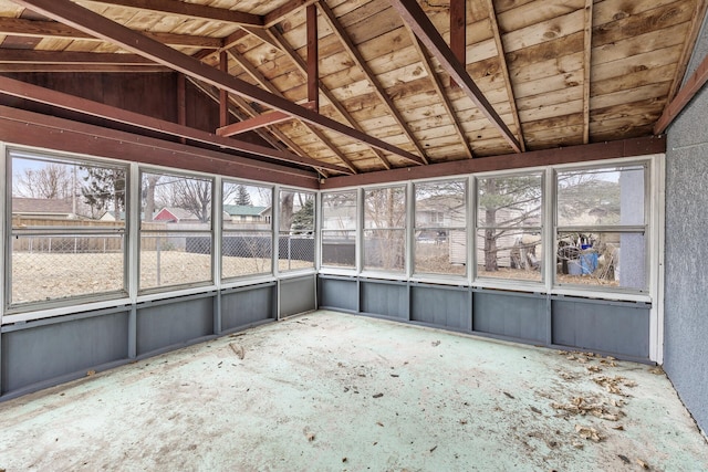 unfurnished sunroom with vaulted ceiling