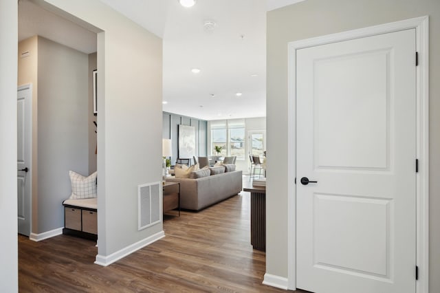 hallway featuring dark wood-type flooring