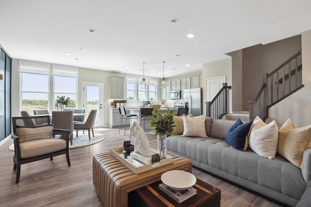 living room with light hardwood / wood-style flooring