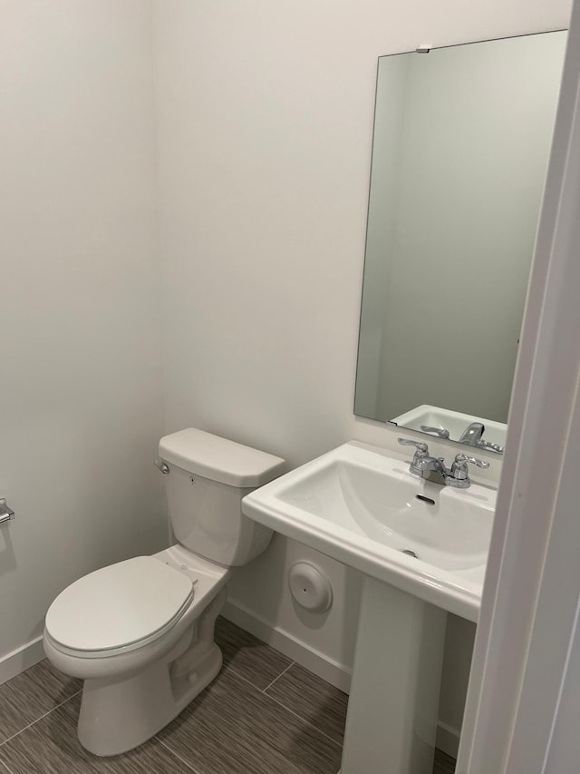 bathroom featuring toilet