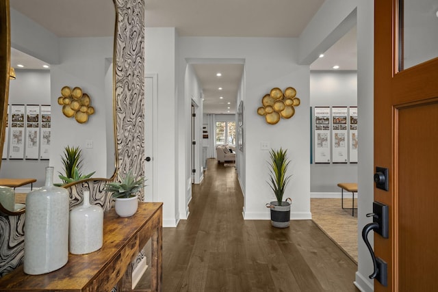 hallway featuring dark wood-type flooring