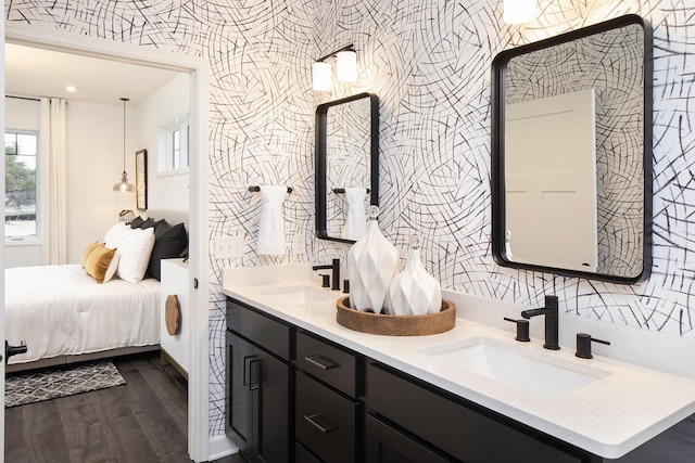 bathroom with vanity and wood-type flooring