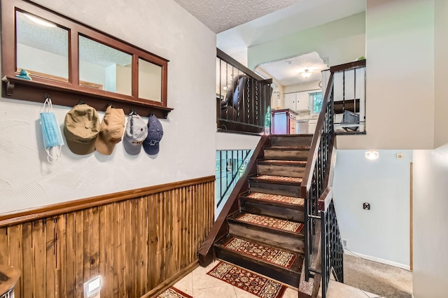11132 100th Pl N, Maple Grove, MN 55369 - staircase with wainscoting and wooden walls