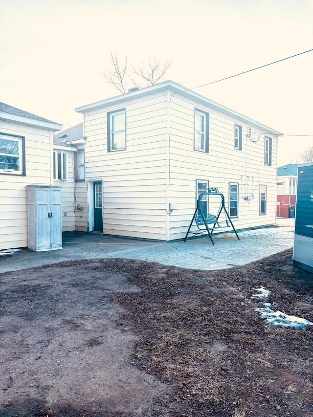 back of house featuring a patio area