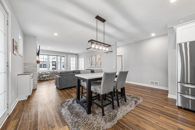 5051 216th St W, Farmington, MN 55024 - dining space with dark wood-type flooring, recessed lighting, and baseboards