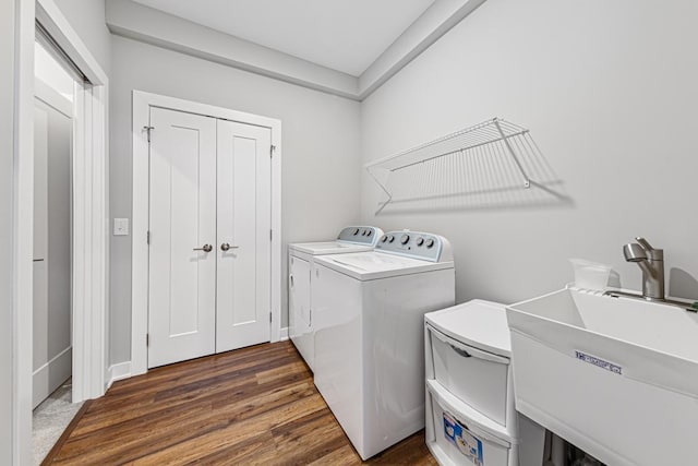 5051 216th St W, Farmington, MN 55024 - laundry room with washer and dryer and dark wood finished floors