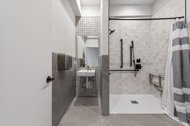 5051 216th St W, Farmington, MN 55024 - bathroom with tiled shower, tile walls, and a sink
