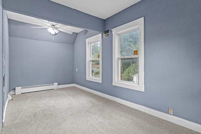 990 Virginia St, Saint Paul, MN 55117 - spare room featuring a baseboard heating unit, carpet, vaulted ceiling, and ceiling fan