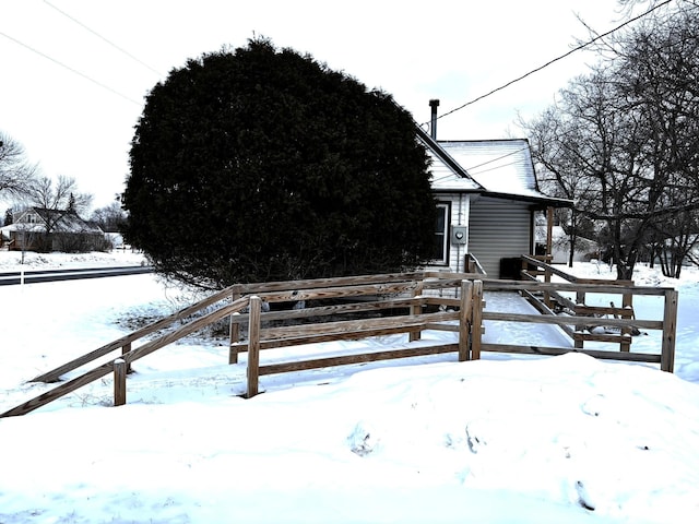 view of yard covered in snow