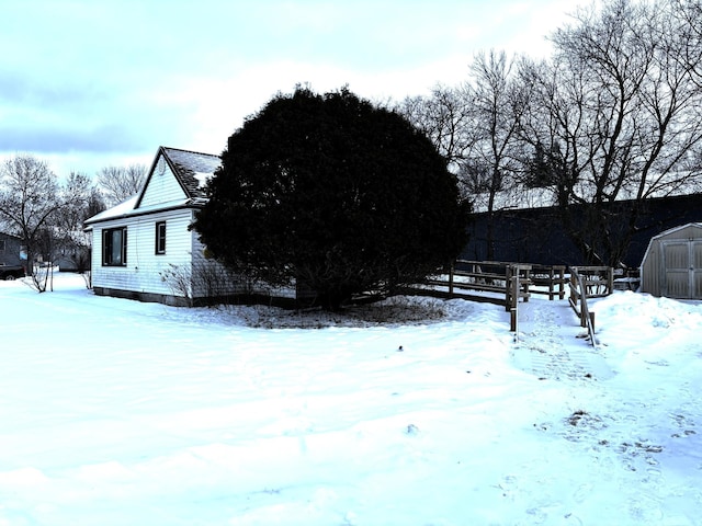 exterior space featuring a shed