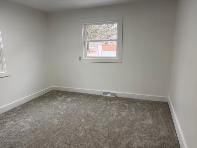 view of carpeted spare room