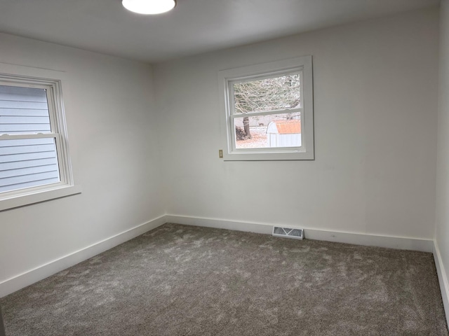 view of carpeted spare room