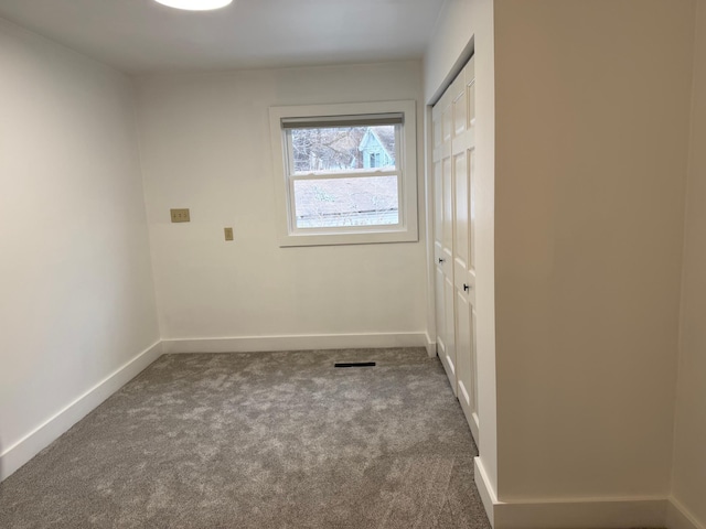 empty room with carpet floors