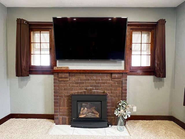 room details with a fireplace and carpet