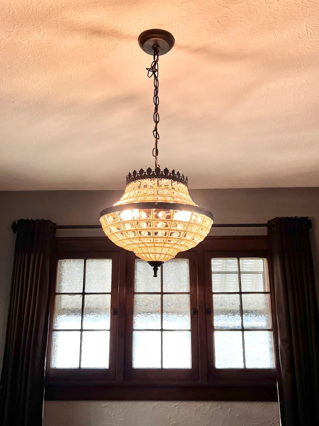 interior details with a textured ceiling