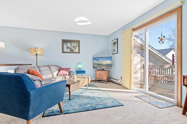 living room with a baseboard heating unit and light colored carpet