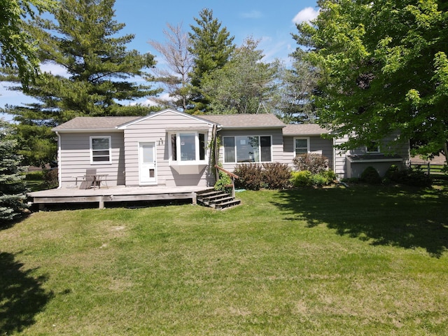 3685 Watertown Rd, Orono, MN 55359 - back of house featuring a wooden deck, a lawn, and roof with shingles