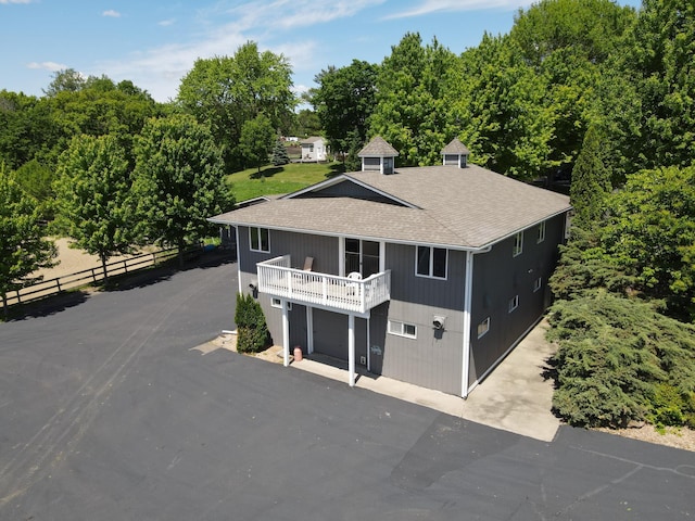 3685 Watertown Rd, Orono, MN 55359 - view of front of property featuring roof with shingles and a balcony