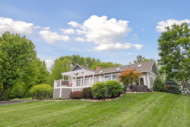 3685 Watertown Rd, Orono, MN 55359 - view of front of property featuring a pergola, a front lawn, a hot tub, and a chimney
