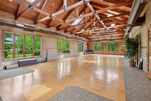 3685 Watertown Rd, Orono, MN 55359 - miscellaneous room featuring high vaulted ceiling, wood ceiling with exposed beams, and a wainscoted wall