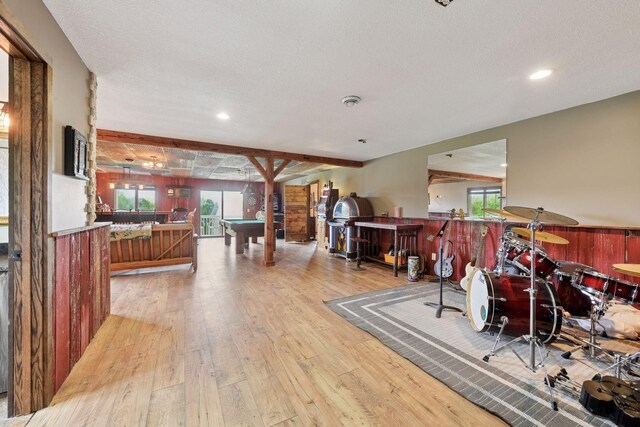 3685 Watertown Rd, Orono, MN 55359 - playroom featuring hardwood / wood-style flooring, billiards table, a textured ceiling, recessed lighting, and bar