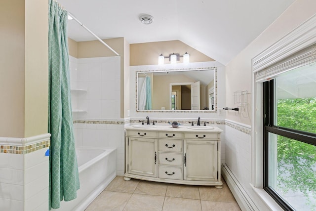 3685 Watertown Rd, Orono, MN 55359 - full bath with tile walls, shower / bathtub combination with curtain, tile patterned flooring, double vanity, and lofted ceiling