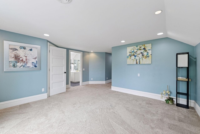 3685 Watertown Rd, Orono, MN 55359 - unfurnished living room with carpet floors, baseboards, recessed lighting, and lofted ceiling
