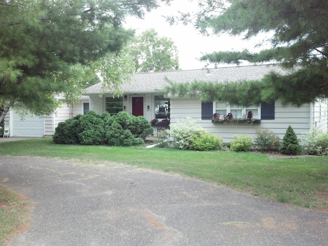 3685 Watertown Rd, Orono, MN 55359 - ranch-style house with a garage, a shingled roof, and a front yard