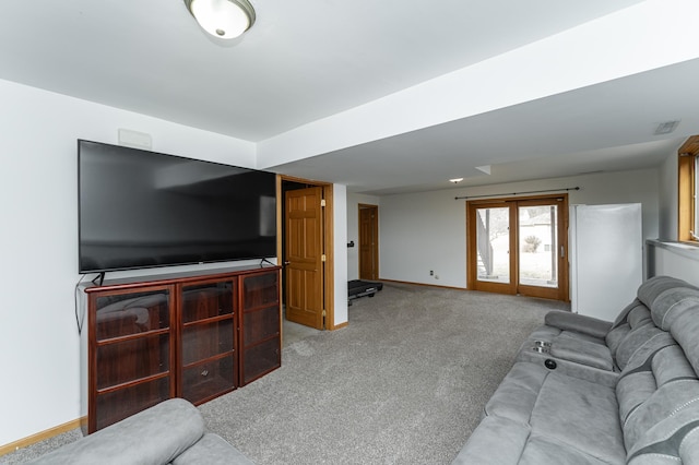 living room featuring light colored carpet