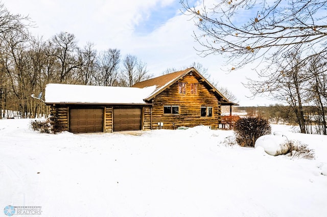 exterior space featuring a garage