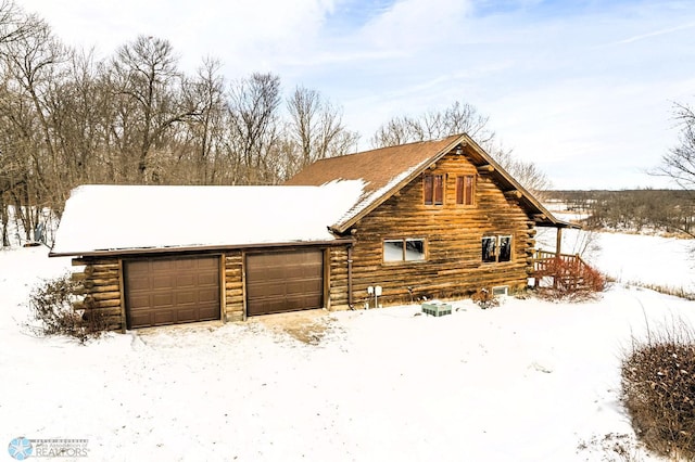 view of front of home featuring a garage