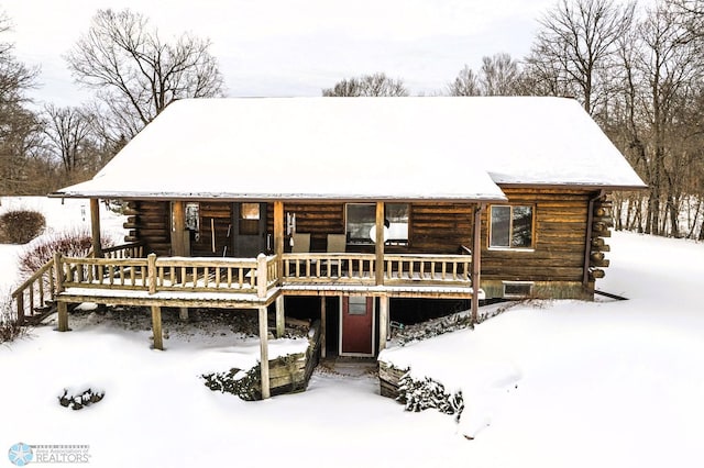 cabin featuring a deck