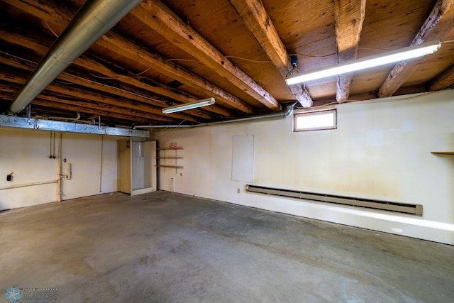 basement featuring a baseboard radiator