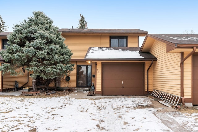 view of front of home with a garage