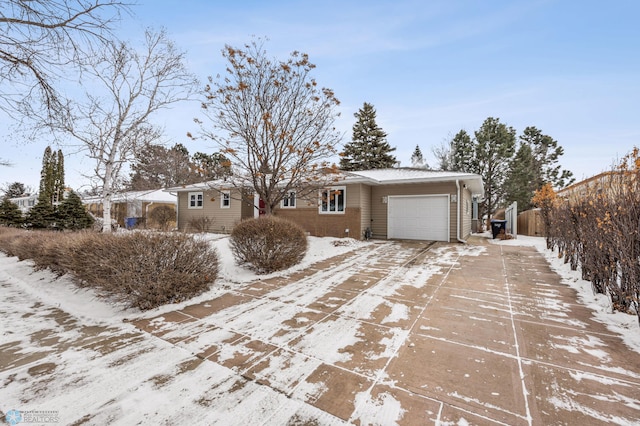 ranch-style home with a garage