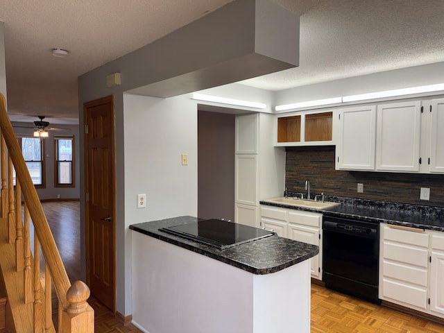 kitchen with open shelves, a peninsula, a textured ceiling, black appliances, and a sink