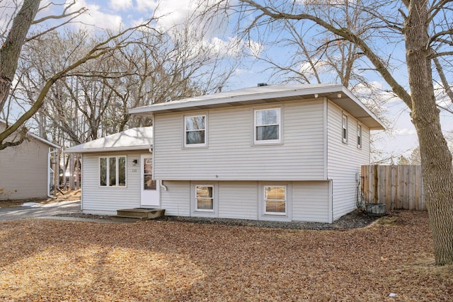 view of front of property featuring fence