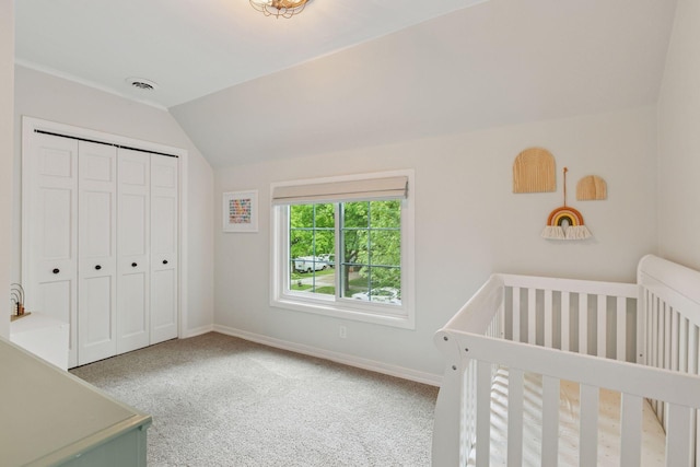 1989 Iglehart Ave, Saint Paul, MN 55104 - unfurnished bedroom featuring carpet flooring, vaulted ceiling, baseboards, and a closet
