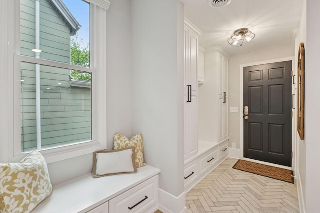 1989 Iglehart Ave, Saint Paul, MN 55104 - mudroom featuring baseboards