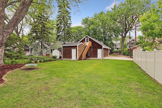 1989 Iglehart Ave, Saint Paul, MN 55104 - view of yard with a garage