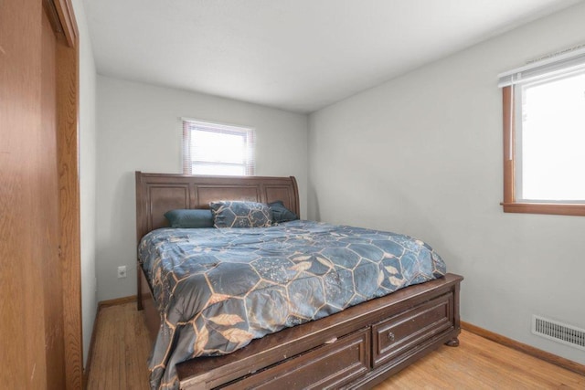 bedroom featuring light hardwood / wood-style floors