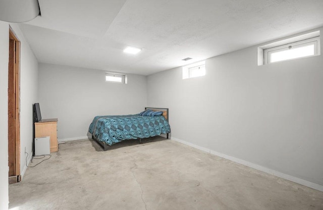 bedroom featuring multiple windows