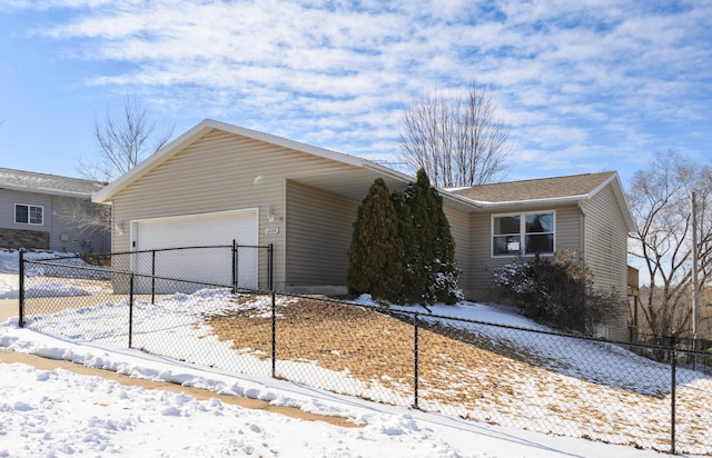 view of front of property with driveway and fence