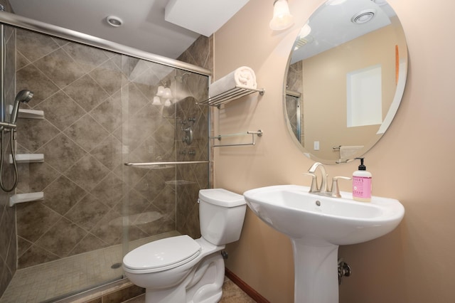 full bath with a shower stall and toilet